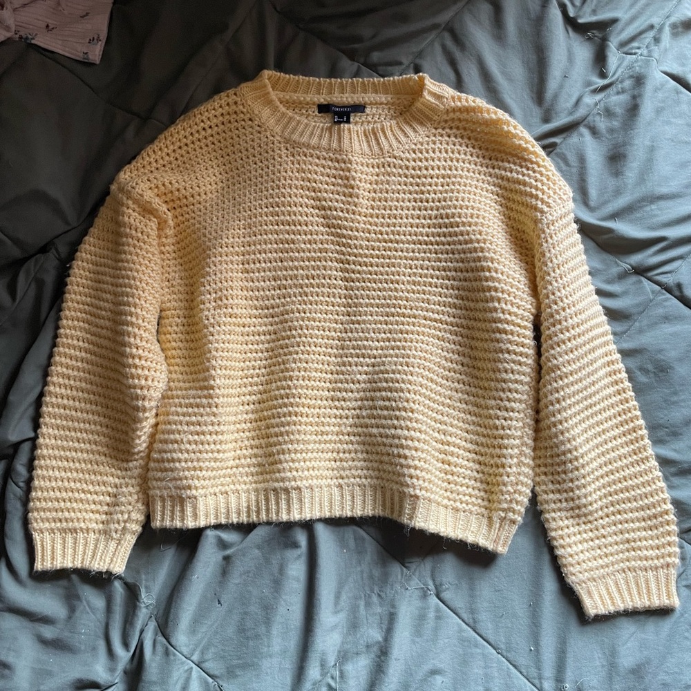 pale yellow sweater